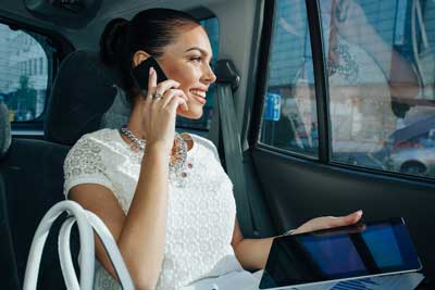 Businesswoman Traveling to the Airport